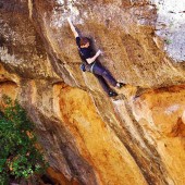 jonny stocking climbing an 8a in siurana